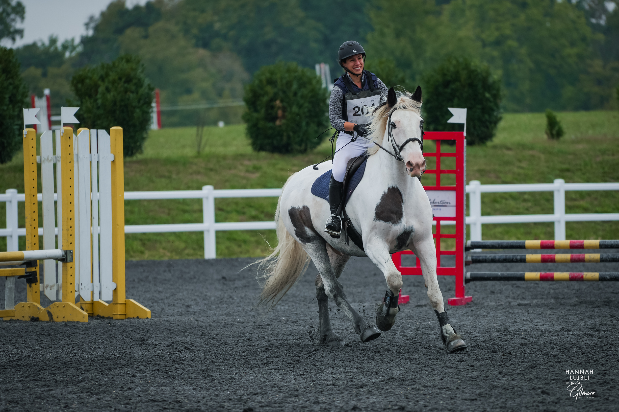 Frankie and smiling rider compete at an event